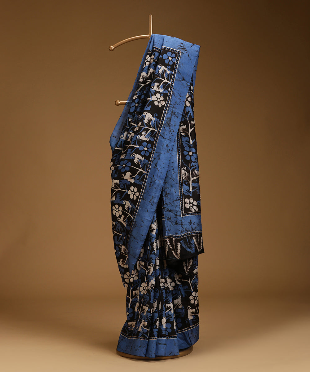 Handloom_Blue_and_Black_Hand_Batik_Mulberry_Silk_Saree_with_All_Over_Floral_Motifs_WeaverStory_01