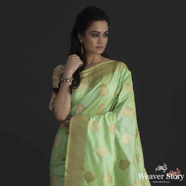 Light_Green_katan_silk_saree_with_mehraab_booti_WeaverStory_01