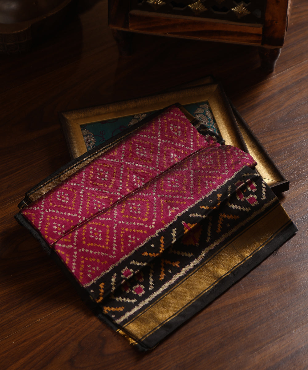 Handloom_Plum_And_Black_Pure_Mulberry_Silk_Ikat_Patola_Dupatta_With_Black_And_Golden_Border_WeaverStory_01