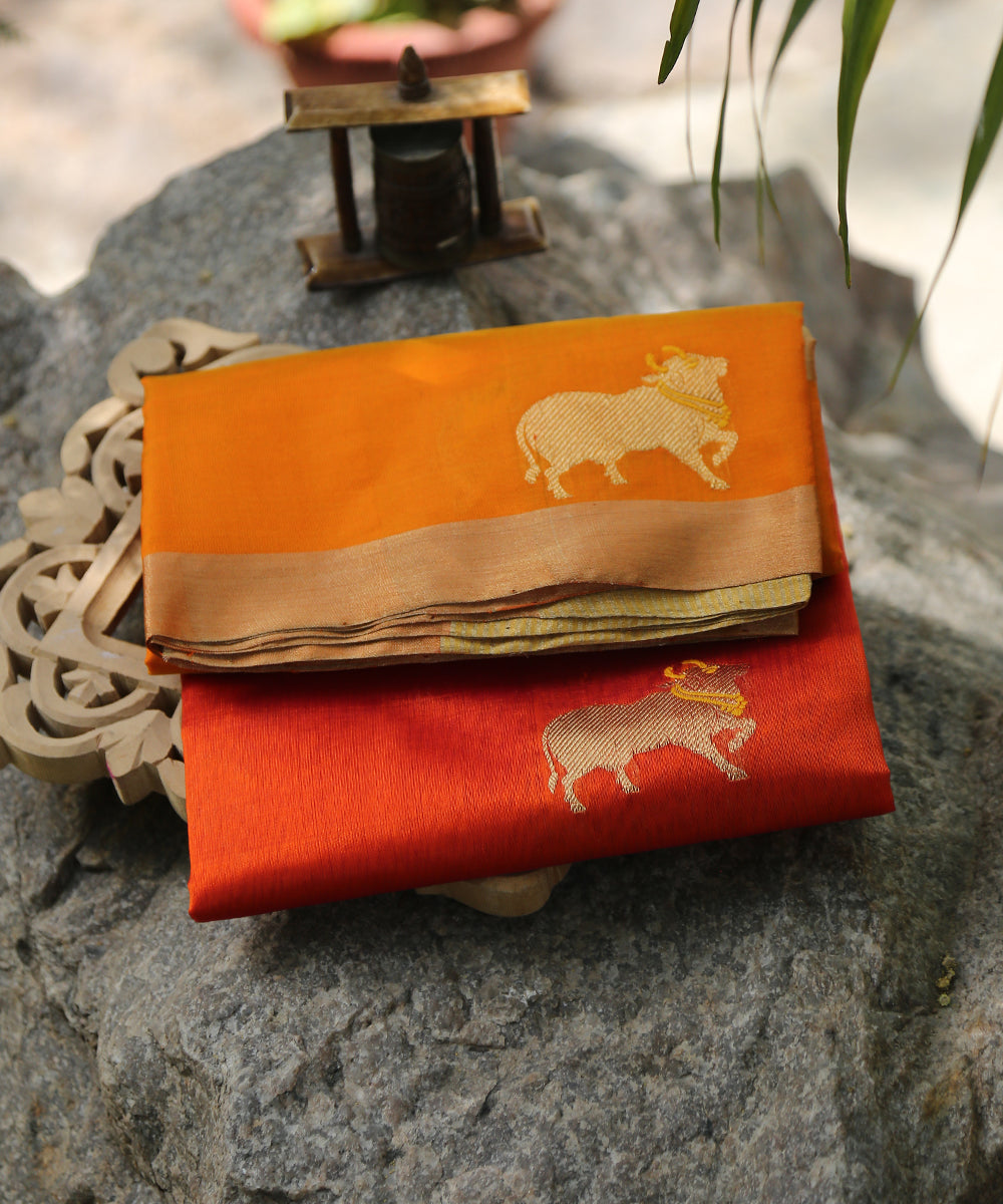 Orange_Handloom_Silk_Chanderi_Dupatta_With_Nandi_Motif_On_Border_WeaverStory_01