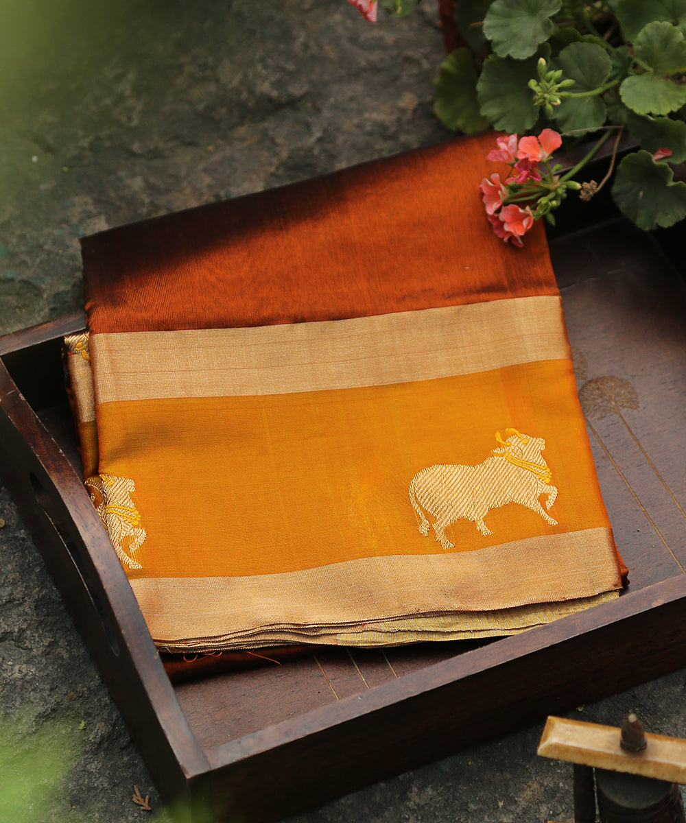 Handloom_Rust_Silk_Chanderi_Dupatta_With_Nandi_Motif_On_Border_WeaverStory_01