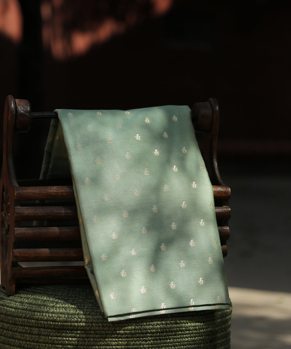 Handloom_Pastel_Pistachio_Green_Pure_Moonga_Silk_Banarasi_Fabric_With_Cutwork_Sona_Rupa_Booti_WeaverStory_01