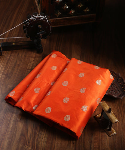 Handloom_Orange_Pure_Katan_Silk_Banarasi_Fabric_with_Paisley_Booti_WeaverStory_01