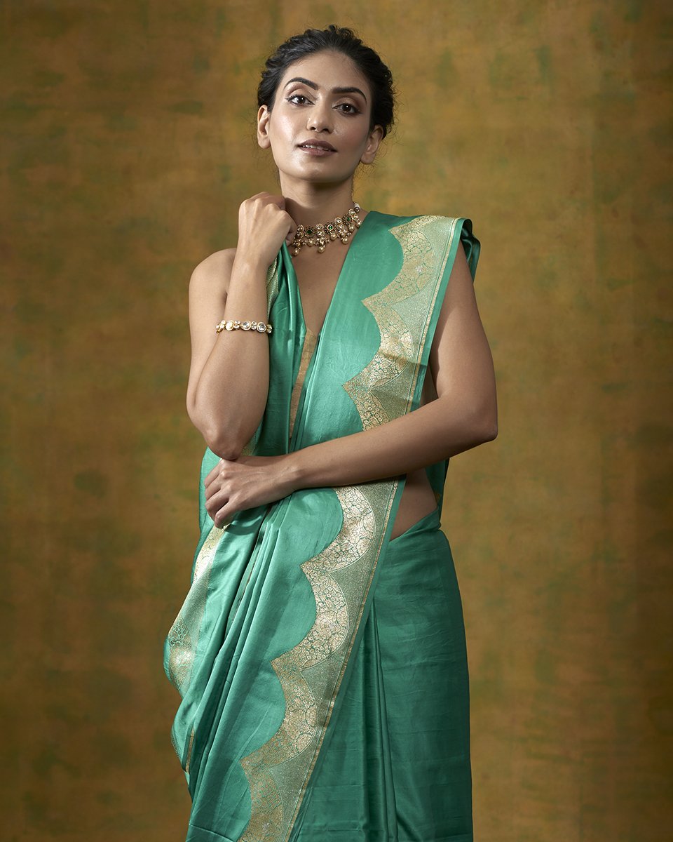 Green_Handloom_Plain_Satin_Saree_With_Zari_Border_WeaverStory_01