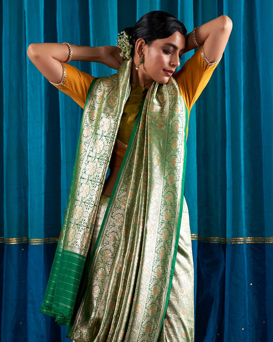 Handloom_Green_Banarasi_Silk_Saree_with_Floral_Design_with_Meenakari_WeaverStory_01