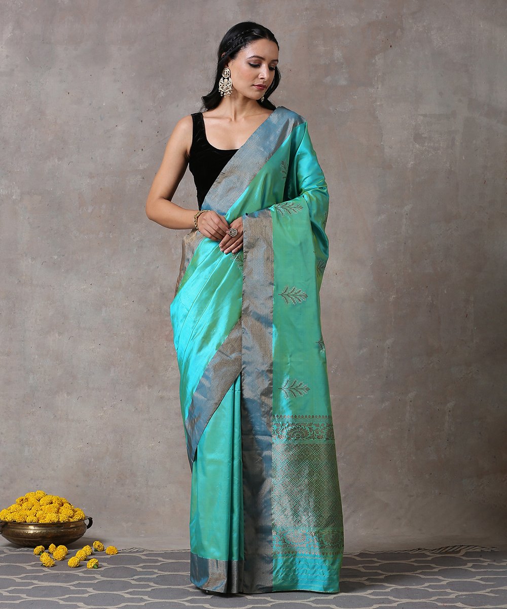 Handloom_Green_Pure_Katan_Silk_Banarasi_Saree_With_Antique_Zari_Border_Leaf_Booti_WeaverStory_01