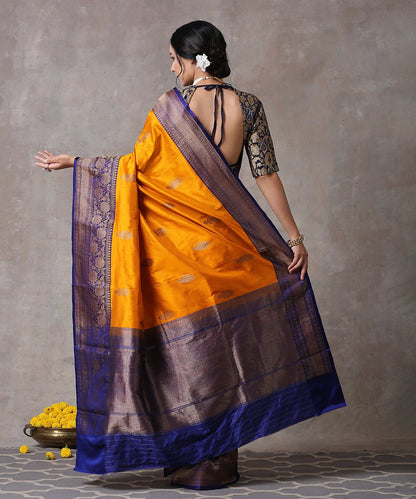 Handloom_Yellow_Pure_Katan_Silk_Banarasi_Saree_With_Purple_Floral_Border_WeaverStory_03