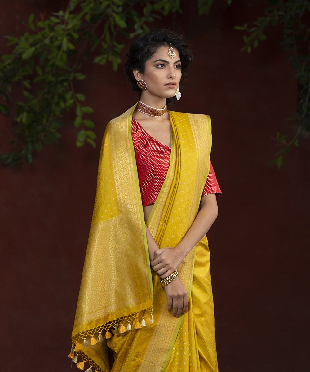 Handloom_Yellow_With_Green_Embossed_Weave_Katan_Silk_Banarasi_Saree_WeaverStory_01