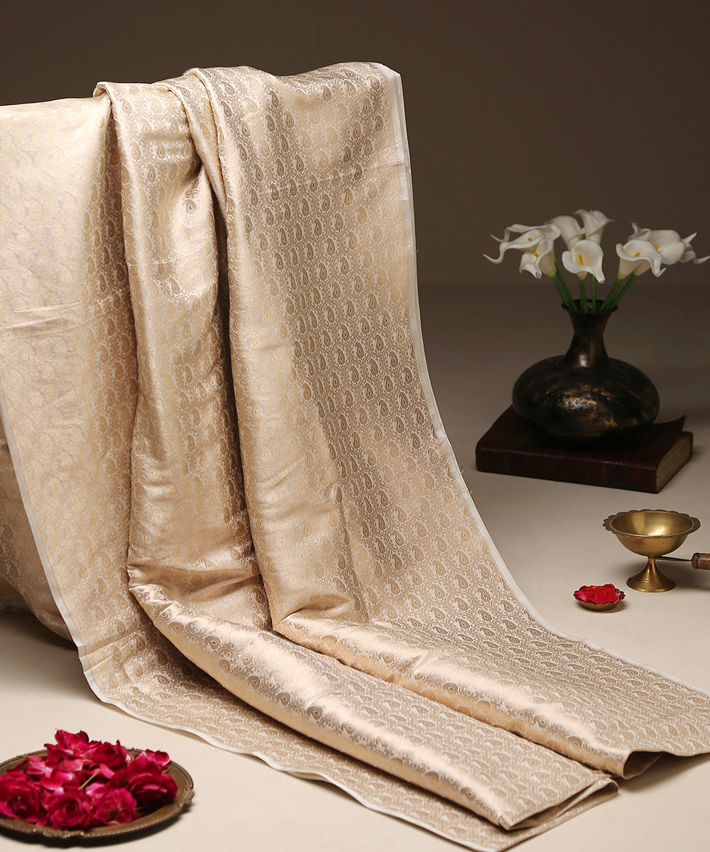 OffWhite_and_Gold_Pure_Katan_Silk_Banarasi_Handloom_Fabric_with_Paisleys_WeaverStory_01