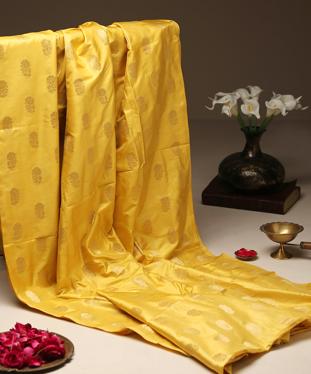 Yellow_Pure_Katan_Silk_Banarasi_Handloom_Fabric_with_Mughal_Phool_Patti_Motifs_WeaverStory_01