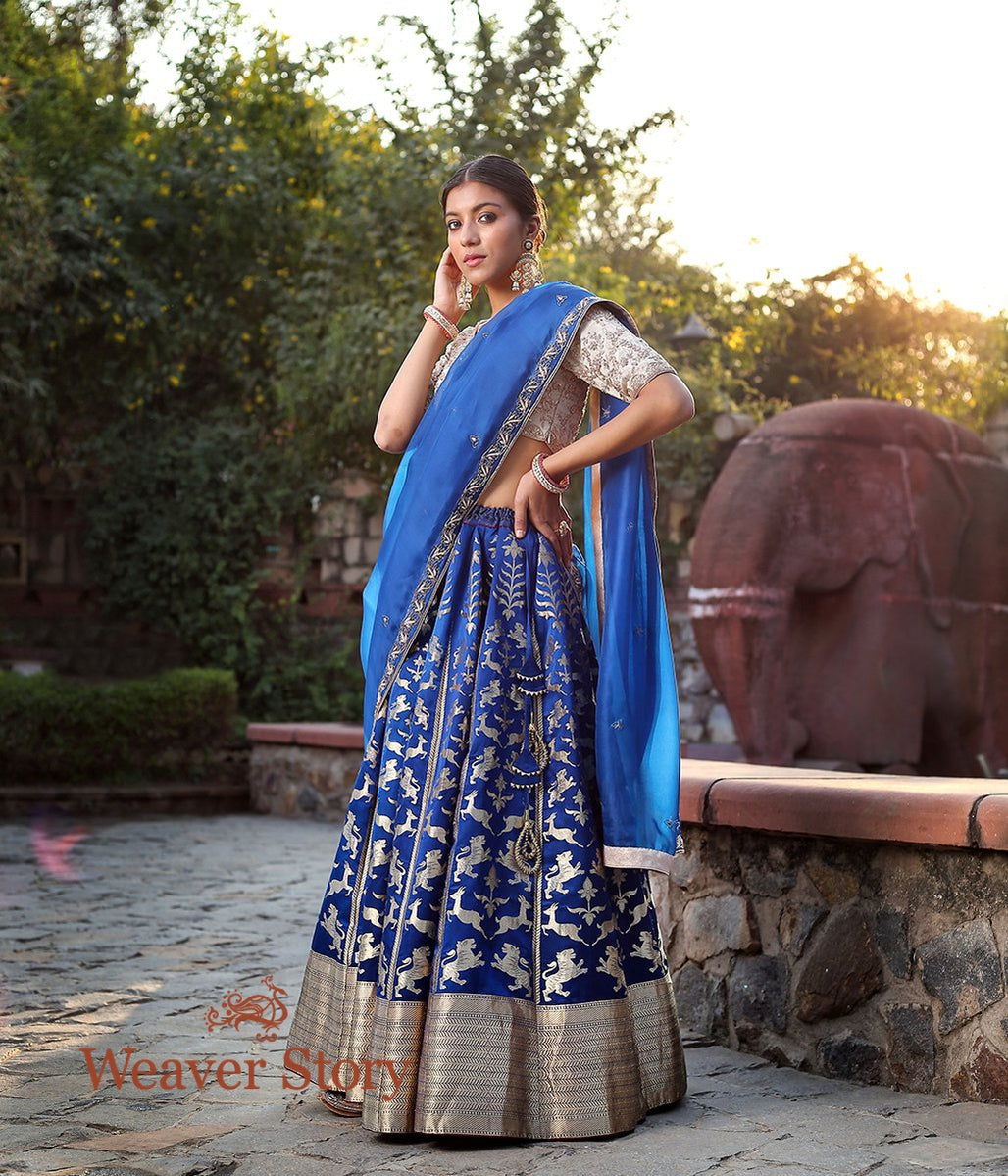Handwoven_Royal_Blue_Shikargah_Lehenga_with_Lion_Motifs_WeaverStory_01