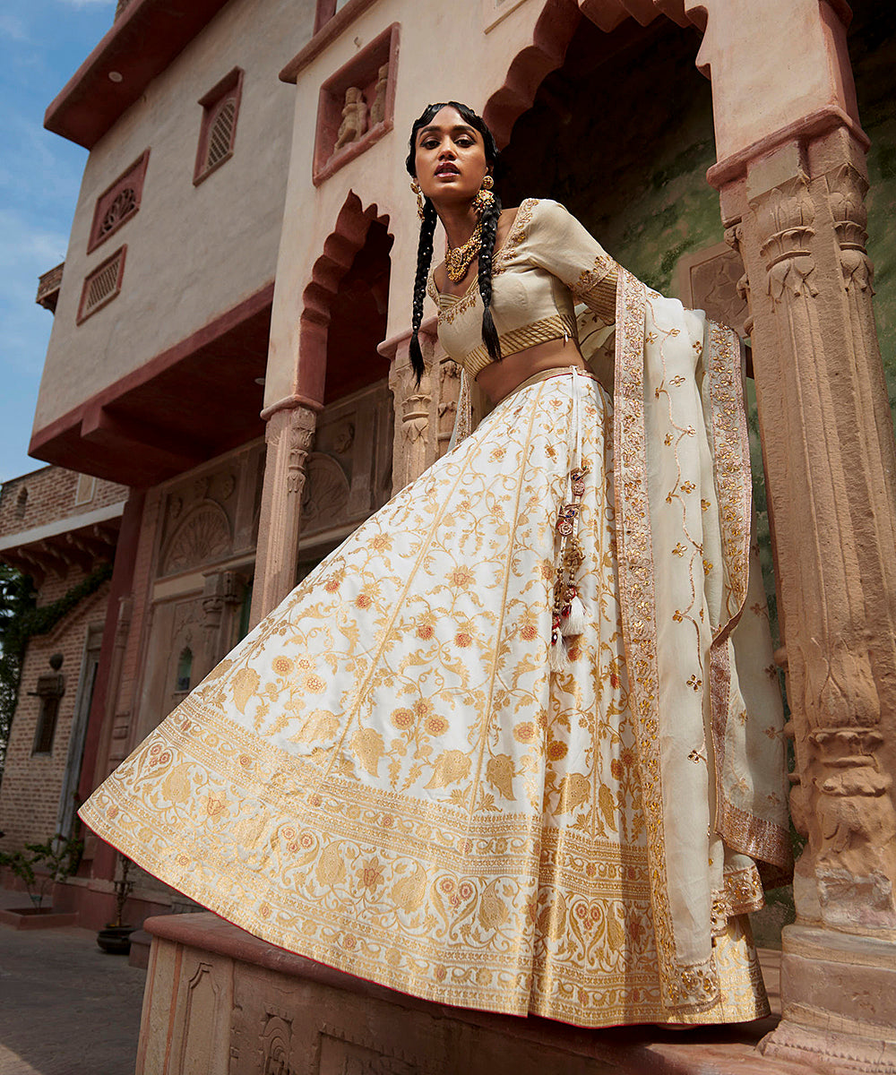 Handloom_White_Mughal_Jaal_Pure_Katan_Silk_Banarasi_lehenga_with_Gotta_work_Zardozi_Dupatta_and_Blouse_WeaverStory_02