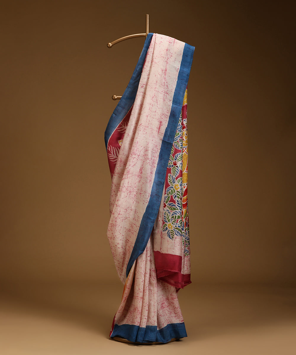 Handloom_Offwhite_and_Orange_Hand_Batik_Mulberry_Silk_Saree_WeaverStory_01