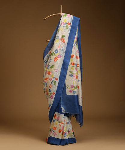 Handloom_Offwhite_and_Blue_Hand_Batik_Mulberry_Silk_Saree_With_Butterfly_Motifs_WeaverStory_01
