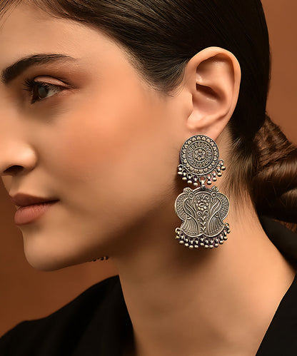 Ishi_Handcrafted_Pure_Silver_Earrings_With_Peacock_Motif_WeaverStory_02