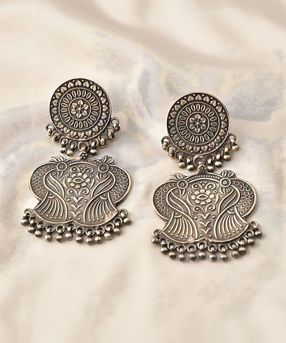 Ishi_Handcrafted_Pure_Silver_Earrings_With_Peacock_Motif_WeaverStory_01
