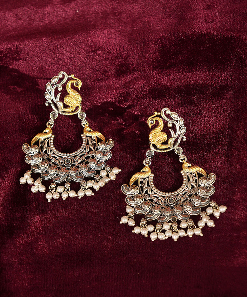 Joti_Handcrafted_Pure_Silver_Earrings_With_Peacock_Motifs_WeaverStory_02