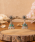 Farah_Handcrafted_Oxidised_Pure_Silver_Jhumka_Earrings_With_Green_Stones_WeaverStory_01