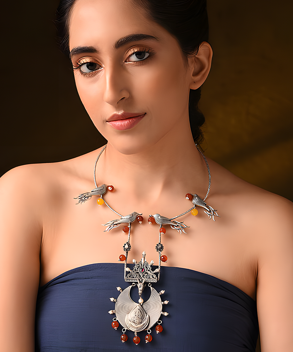 Juhi_Red_And_Yellow_Handcrafted_Tribal_Pure_Silver_Hasli_Necklace_WeaverStory_01