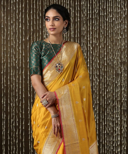 Mustard_Handloom_Kadhwa_Banarasi_Saree_With_Red_Selvedge_and_Booti_Design_WeaverStory_01