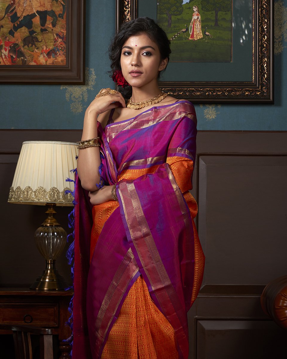 Orange_and_Purple_Handloom_Kanjivaram_Silk_Saree_with_Gold_Zari_Border_WeaverStory_01