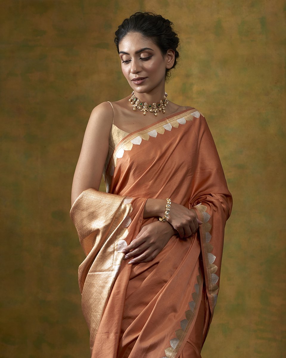 Peach_Handloom_Plain_Satin_Banarasi_Saree_with_Gold_and_Silver_Zari_Border_WeaverStory_01