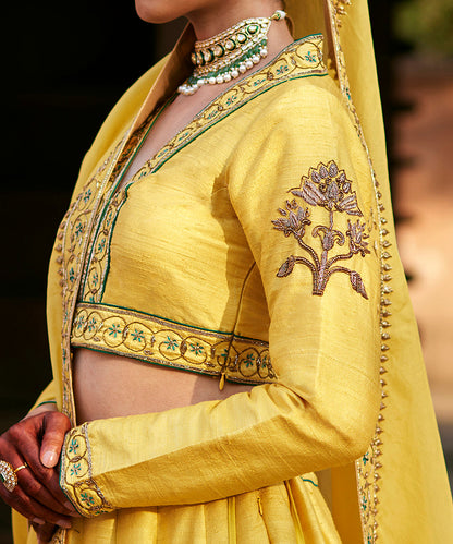 Yellow_Raw_Silk_Embroidered_Lehenga_With_Embroidered_Blouse_And_Organza_Dupatta_WeaverStory_06