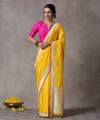 Yellow_Handloom_Pure_Katan_Silk_Cutwork_Banarasi_Saree_with_Antique_Zari_and_Jaal_WeaverStory_01