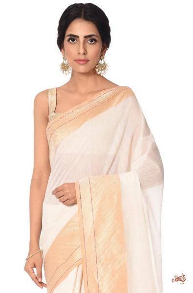 Handloom_Pure_cotton_plain_Sarees_with_konia_Pallu_and_heavy_blouse_-_OffWhite_WeaverStory_01