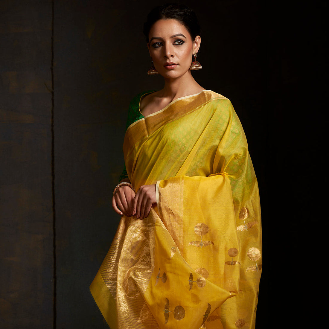 Handwoven_yellow_chanderi_saree_with_sunflower_motif_on_the_pallu_WeaverStory_01