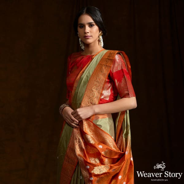 Pista_Green_Kadhiyal_banarasi_Saree_with_Orange_kadhwa_Border_WeaverStory_01