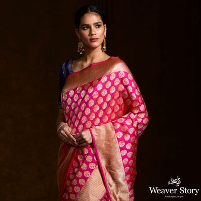 Handwoven_pink_katan_silk_saree_with_floral_motifs_and_zari_border_WeaverStory_01