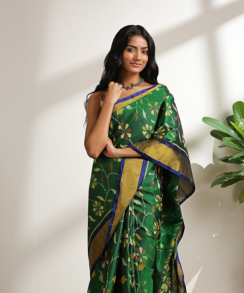 Handloom_Dark_Green_Pure_Mulberry_Silk_Patola_Saree_With_Blue_Border_WeaverStory_01