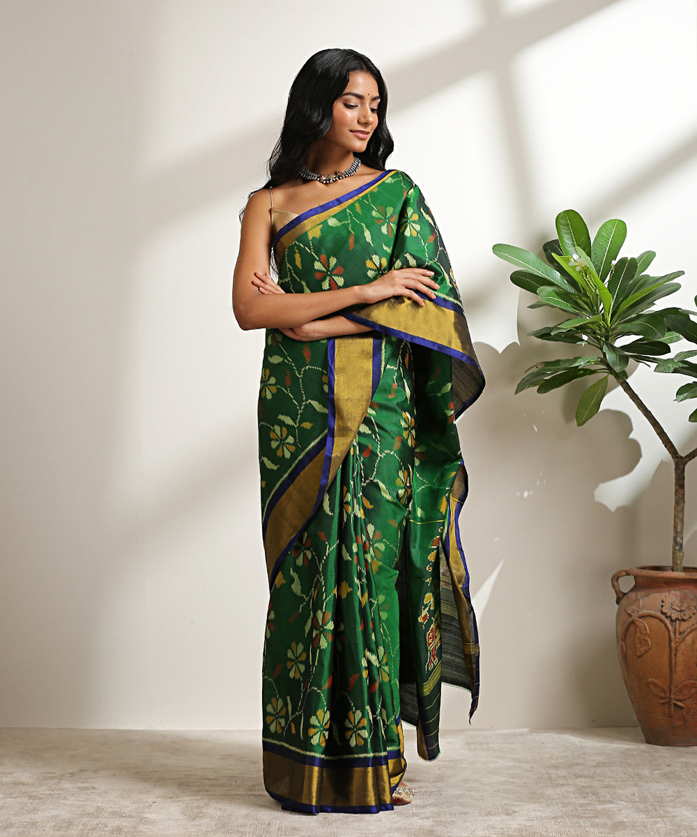 Handloom_Dark_Green_Pure_Mulberry_Silk_Patola_Saree_With_Blue_Border_WeaverStory_02