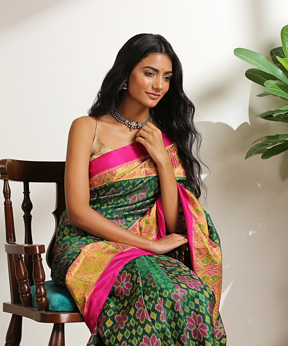 Green_Handloom_Pure_Mulbery_Silk_Patola_Saree_With_Pink_Border_And_Pallu_WeaverStory_01