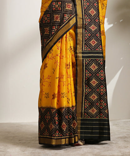 Handloom_Mustard_Pure_Mulberry_Silk_Patola_Saree_With_Black_And_Red_Border_WeaverStory_04