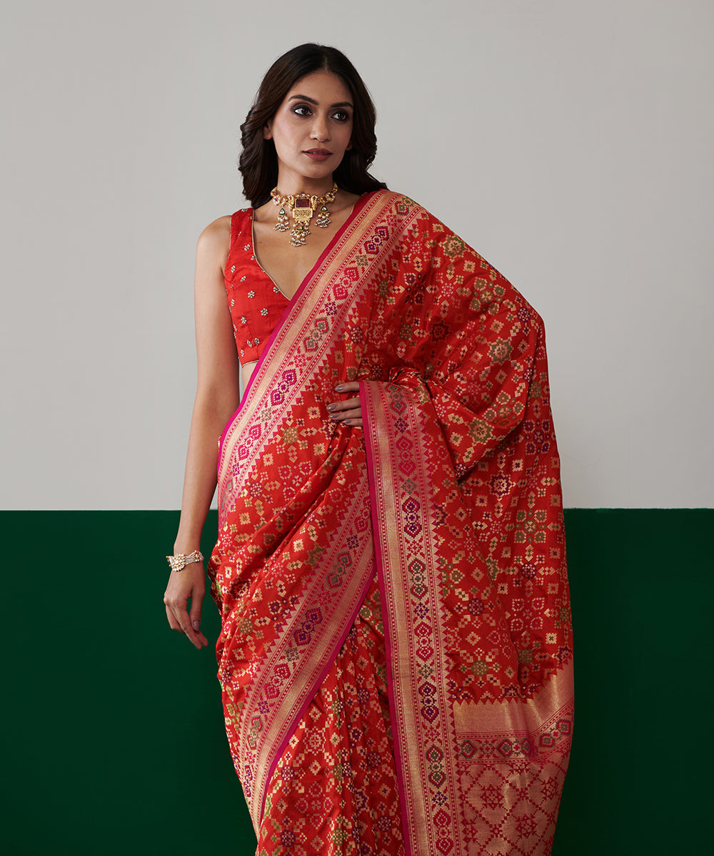 Orange_Handloom_Pure_Katan_Silk_Banarasi_Patola_Saree_With_Pink_Border_WeaverStory_01