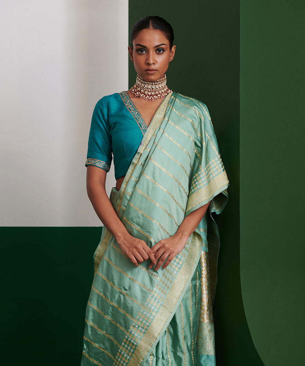 Handloom_Powder_Blue_Mashroo_Silk_Banarasi_Saree_With_Zari_Stripes_WeaverStory_01