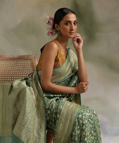 Handloom_Teal_Pure_Georgette_Banarasi_Saree_With_Floral_Jaal_WeaverStory_01