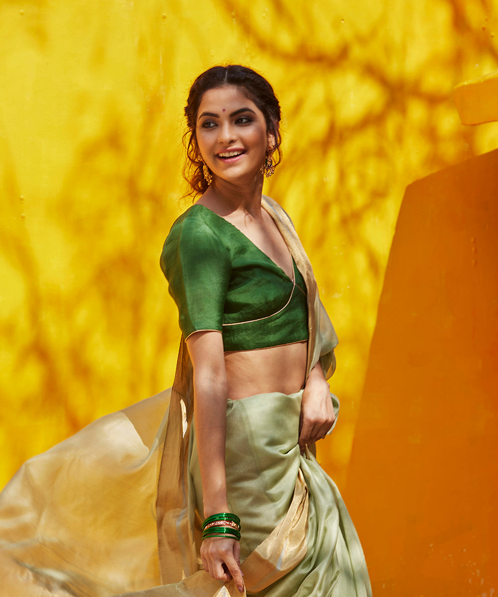 Pista_Green_Handloom_Plain_Cotton_Chanderi_Saree_With_Zari_Border_WeaverStory_01