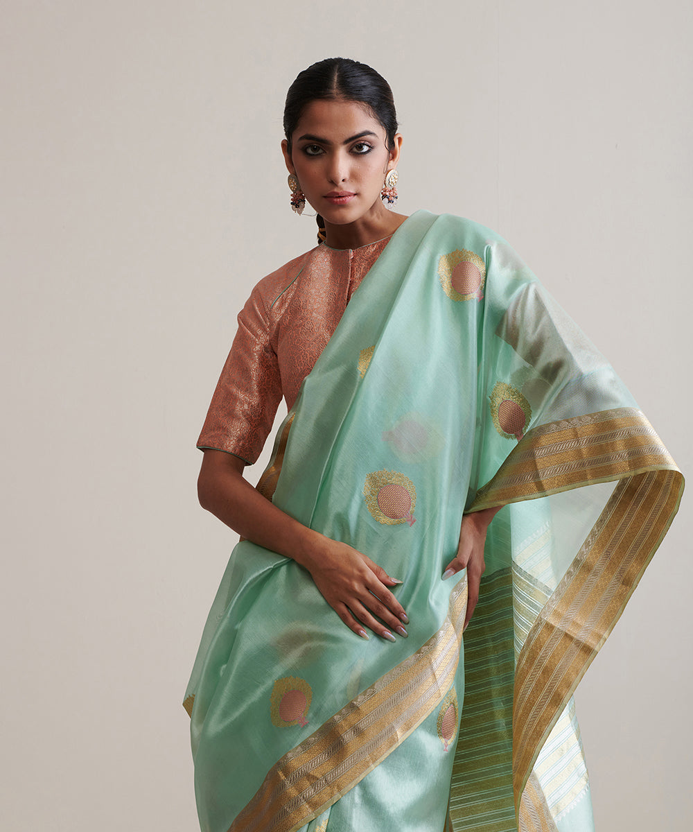 Sage_Green_Handloom_Pure_Chanderi_Silk_Saree_With_Nakshi_Border_And_Anardana_Booti_WeaverStory_01