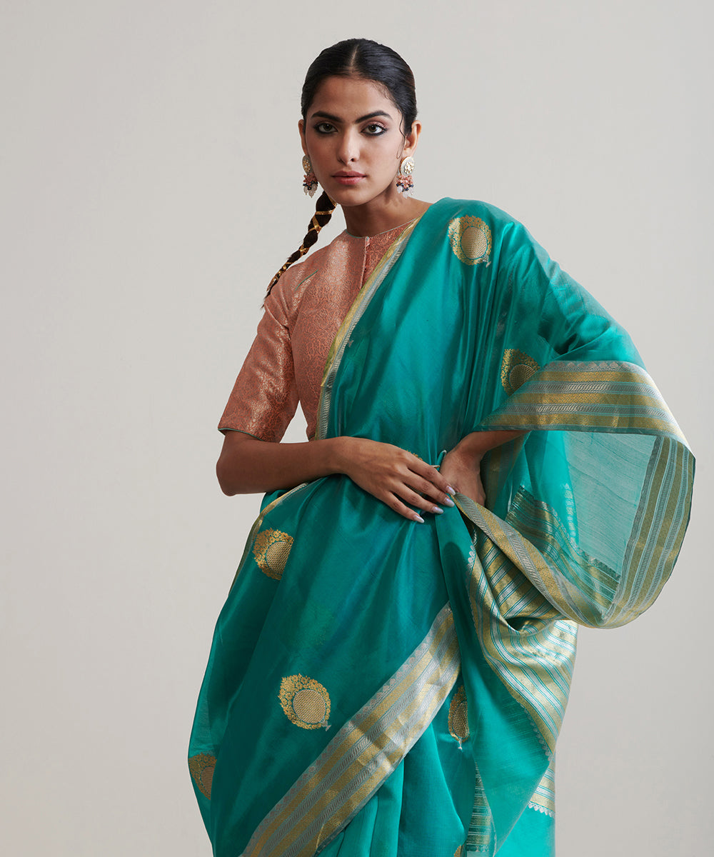 Teal_Handloom_Pure_Chanderi_Silk_Saree_With_Nakshi_Border_And_Anardana_Booti_WeaverStory_01