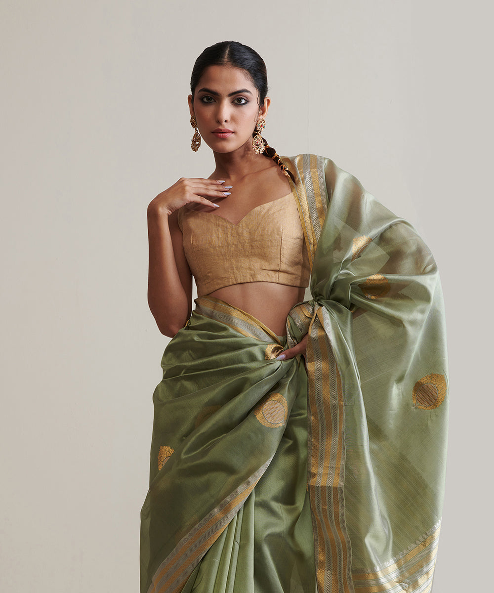 Handloom_Henna_Green_Pure_Chanderi_Silk_Saree_With_Nakshi_Border_And_Anardana_Booti_WeaverStory_01