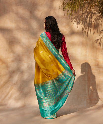 Yellow_Handloom_Pure_Katan_Silk_Banarasi_Saree_With_Sky_Blue_Meenakari_Border_WeaverStory_03