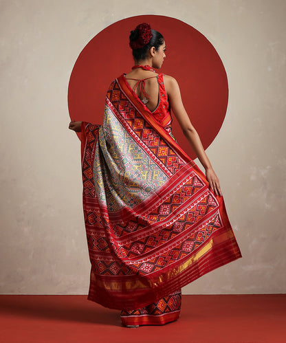 Grey_Handloom_Pure_Mulberry_Ikat_Patola_Saree_With_Red_Border_WeaverStory_03
