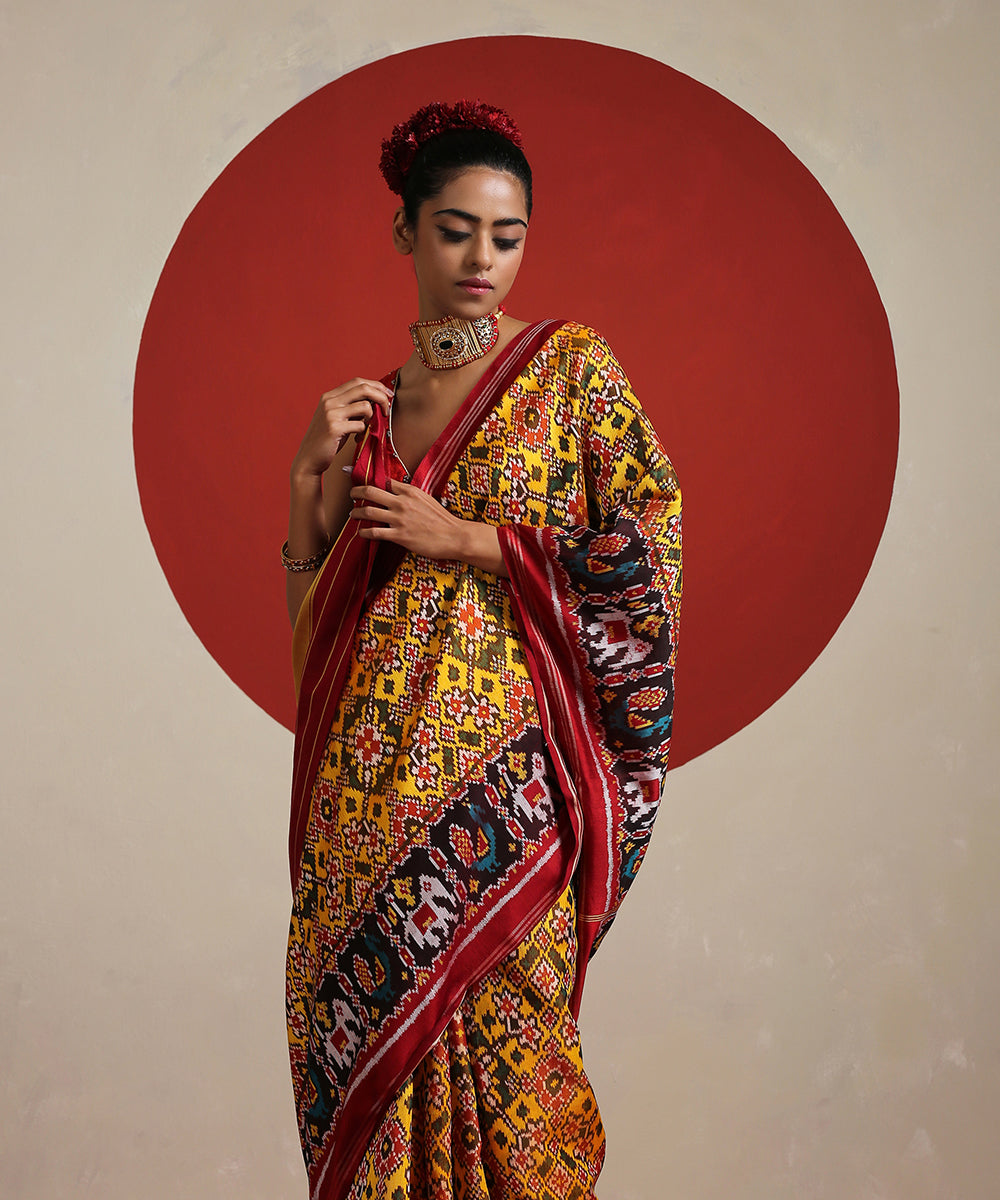 Handloom_Yellow_Pure_Mulberry_Silk_Ikat_Patola_Saree_With_Twill_Weave_WeaverStory_01