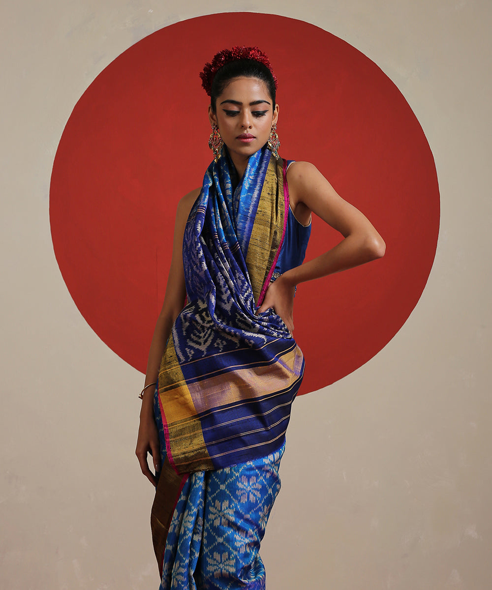 Handloom_Sky_Blue_Raw_Silk_Single_Ikat_Patola_With_Tissue_Border_Saree_WeaverStory_01