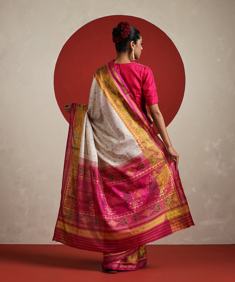 Off_White_Handloom_Pure_Mulberry_Silk_Ikat_Patola_Saree_With_Hot_Pink_Tissue_Border_WeaverStory_03