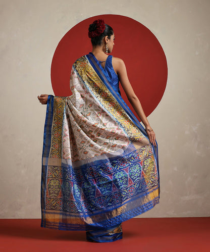Handloom_Off_White_Pure_Mulberry_Silk_Ikat_Patola_Saree_With_Blue_Tissue_Border_WeaverStory_03