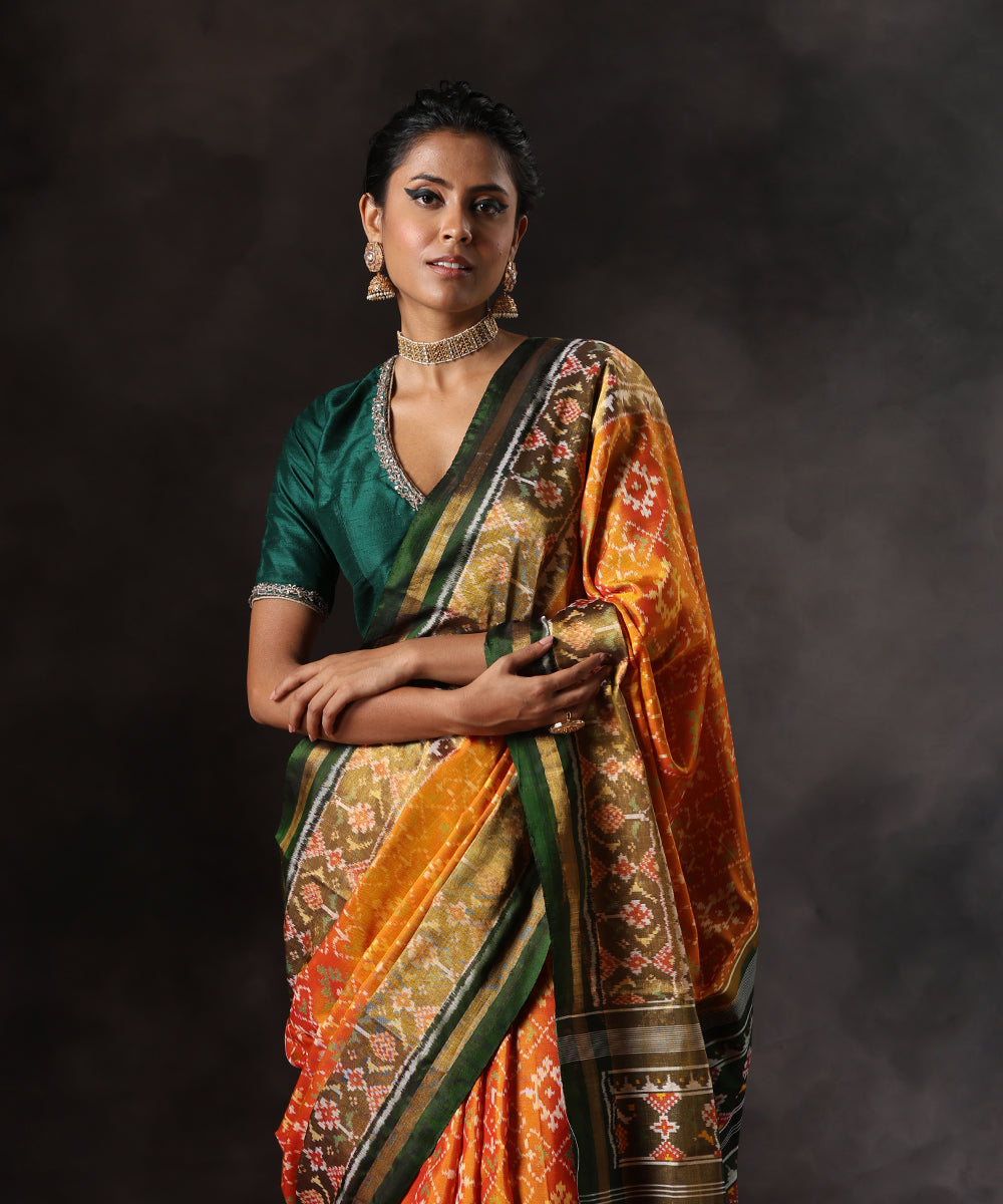 Handloom_Mustard_Pure_Mulberry_Silk_Single_Ikat_Patola_Saree_With_Green_Tissue_Border_WeaverStory_01